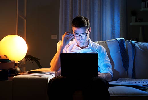 Man working from home on the sofa