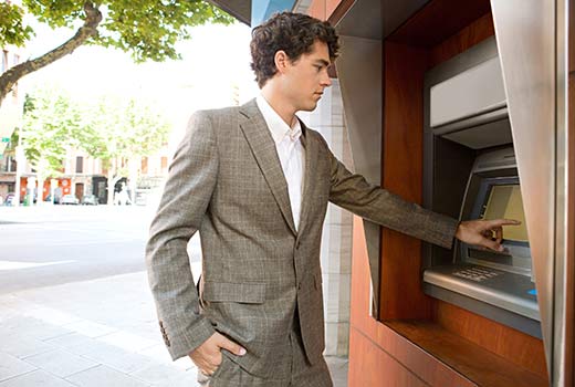 Man withdrawing money from ATM